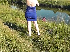Riverside naked milf sunbathing is not shy about random fisher  Outdoo...