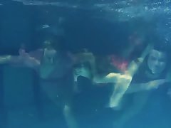 Lesbians are slowly taking off their clothes in the swimming pool and ...